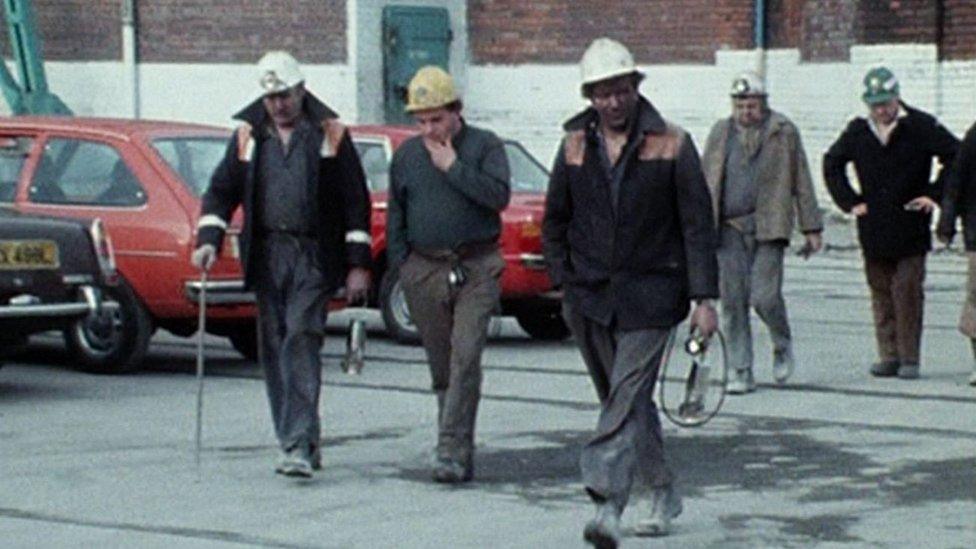 Archive footage of miners at Golborne Colliery