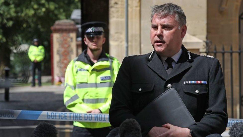 Police Chief Constable John Campbell speaks to the media at the entrance at Forbury Gardens in Reading town centre