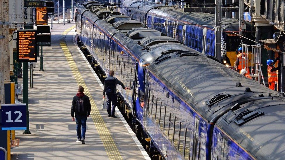 Trains in train station