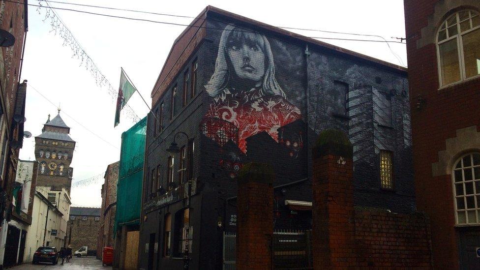 Artwork featuring musician Gwenno, outside Clwb Ifor Bach in Cardiff