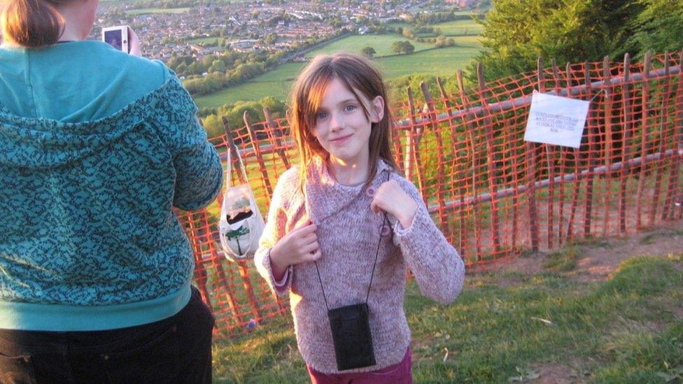 Paige at the cheese rolling event as a child