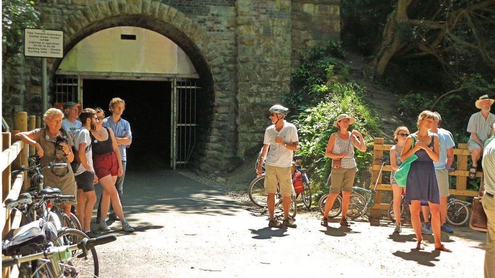 Cyclists at the opening of the Combe Down tunnel