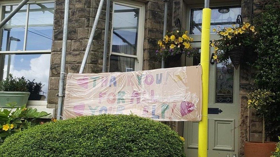 Thank you sign on scaffolding