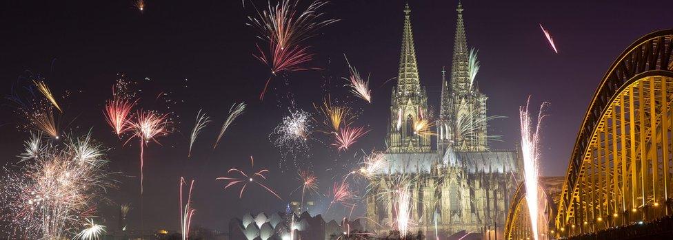 Fireworks explode near Cologne Cathedral (1 Jan)