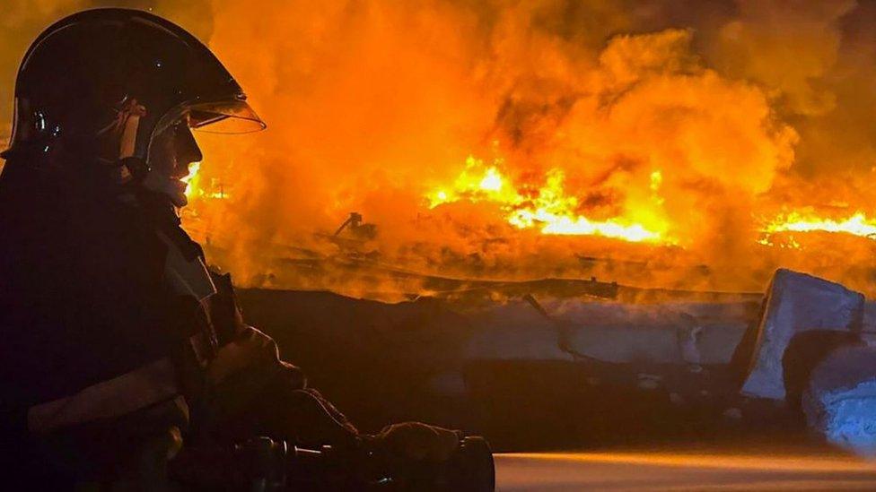 Firefighter tackling at blaze following drone attack