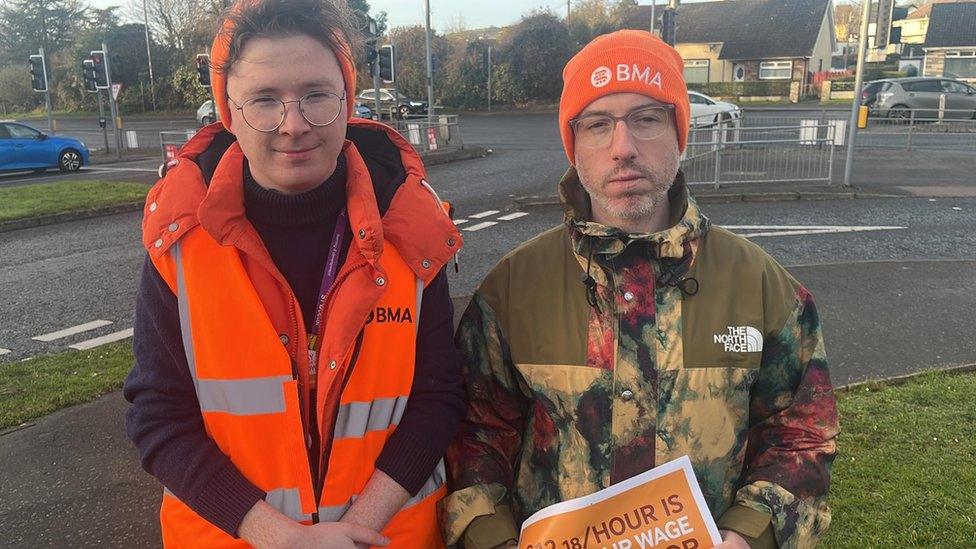 Doctors Rhys Kelly and Adam Flynn are on the picket line In Londonderry