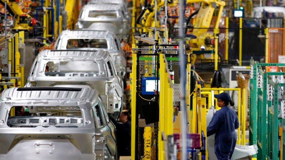 Major carmakers are suing the US government over import taxes.