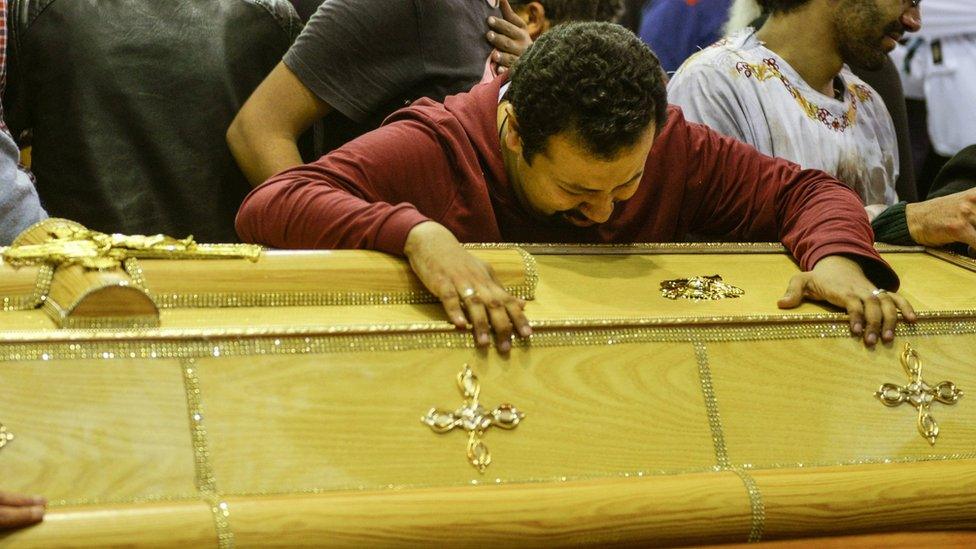 Mourners gather for the funeral for the victims of a bombing at a Coptic church in Tanta, Egypt (10 April 2017)