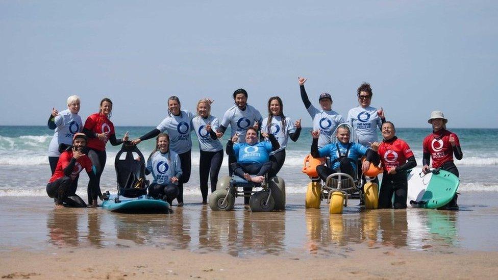 The Wave Project hosting an adaptive surf therapy session at Watergate Bay, Newquay