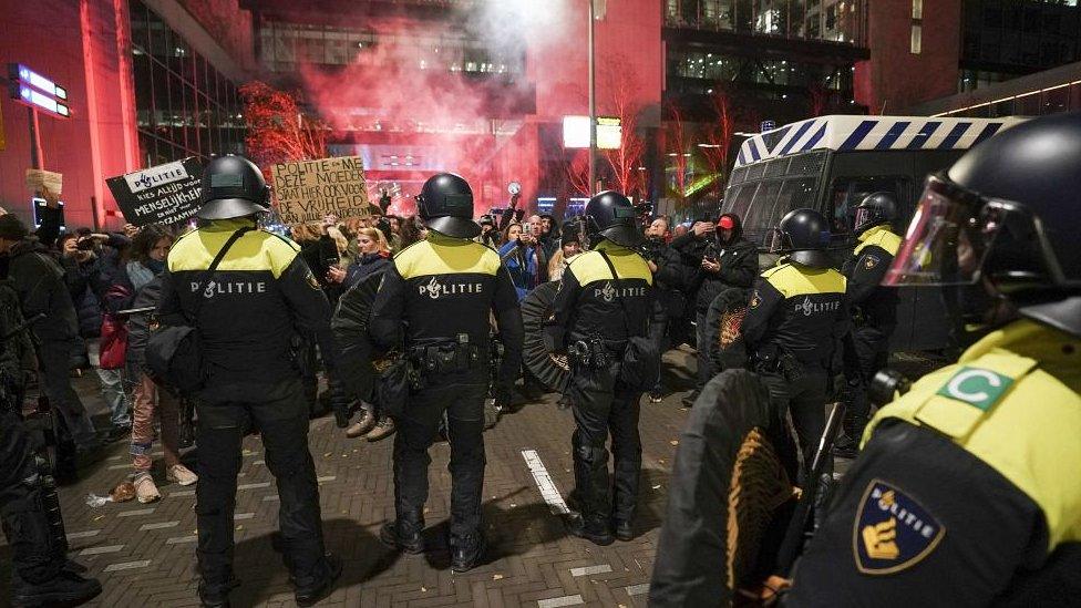 Police in riot gear at protest