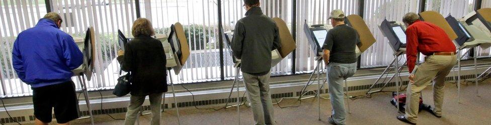 People vote during early voting for the 2016 General Election at the Salt Lake County Government Center on Tuesday, 1 November 2016, in Salt Lake City.