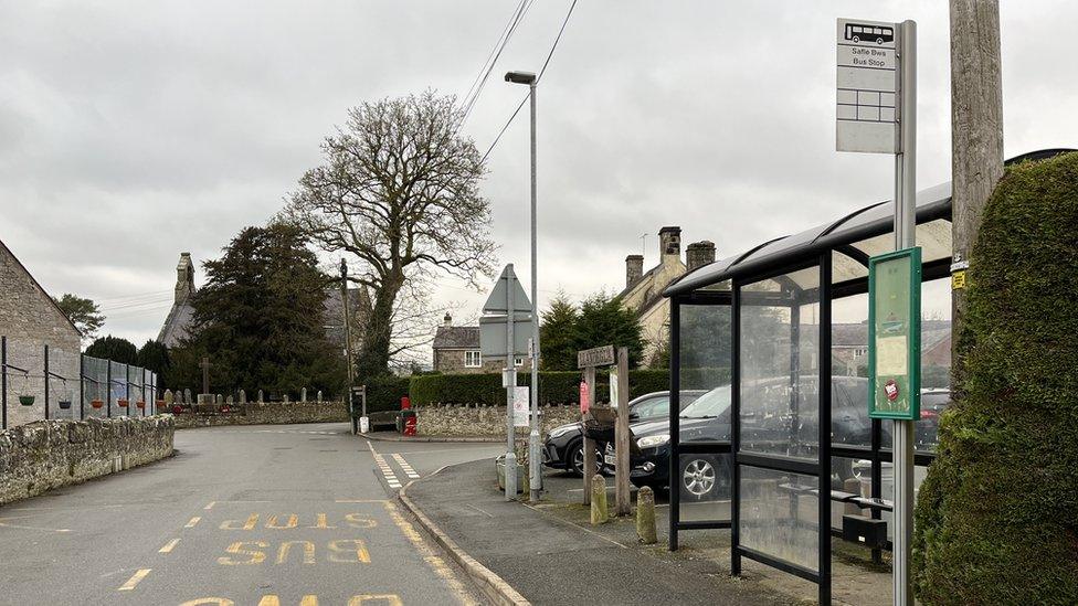 Bus stop in village centre