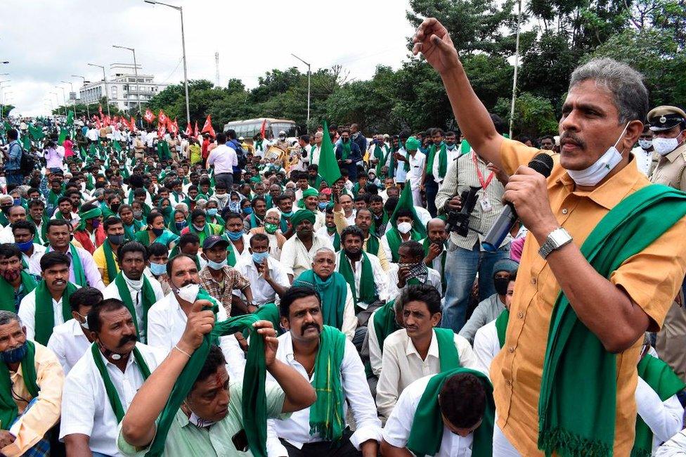 Representatives of various farmers rights organisations stage a demonstration against the passing of agriculture bills introduced in Parliament, in Bangalore on September 21, 2020.