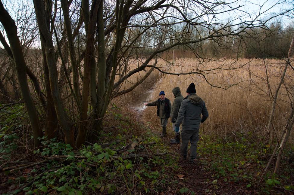 David instructs trainee members of the birding group