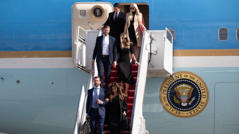 The Trump children and their partners deplane Air Force One in Florida