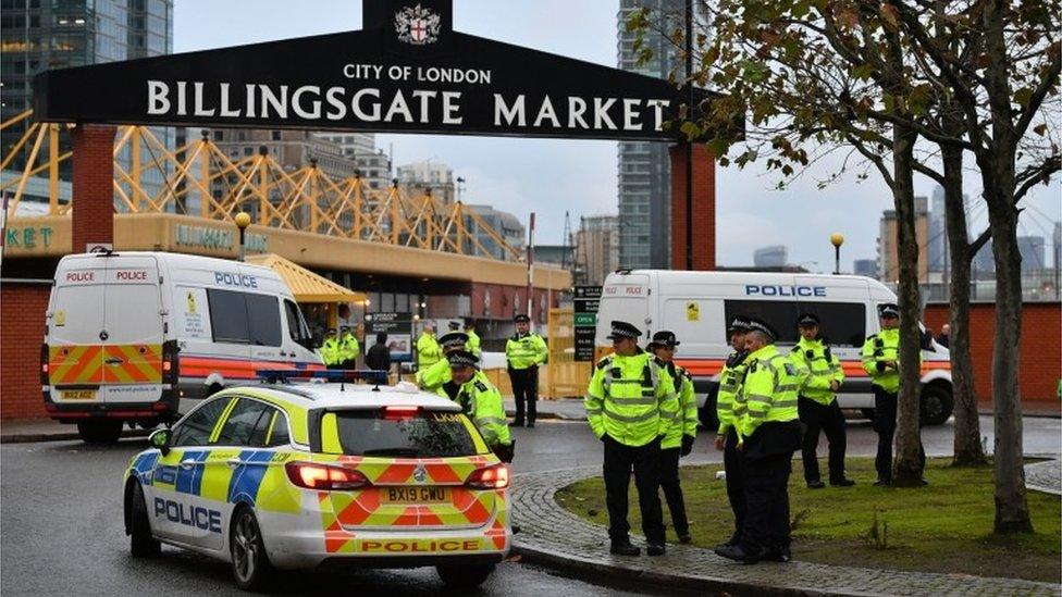 Police outside Billingsgate Market