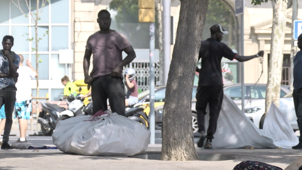 Street sellers in Barcelona