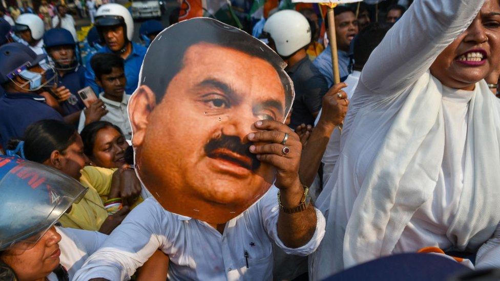 South Kolkata District Congress organized a protest demonstration in front of Governors house in Kolkata ,India , on 13 march 2023 , demanding investigation against Adani enterprises on the Hindenburg claims that have stir controversies against the companies legalities in their accounting and share prices according to reports.