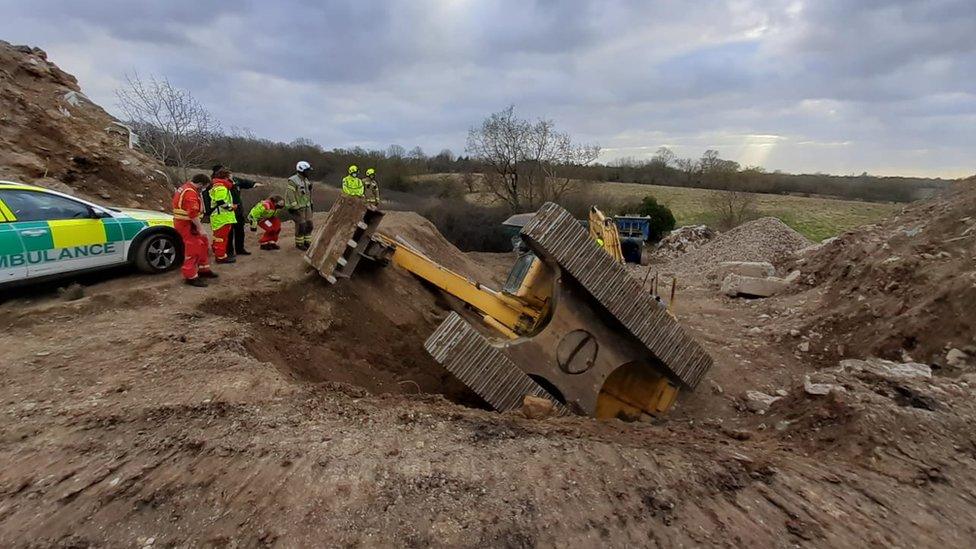 Overturned digger