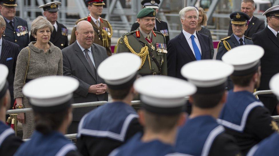 Prime Minister Theresa May and Mayor of Liverpool, Joe Anderson, watching sailors