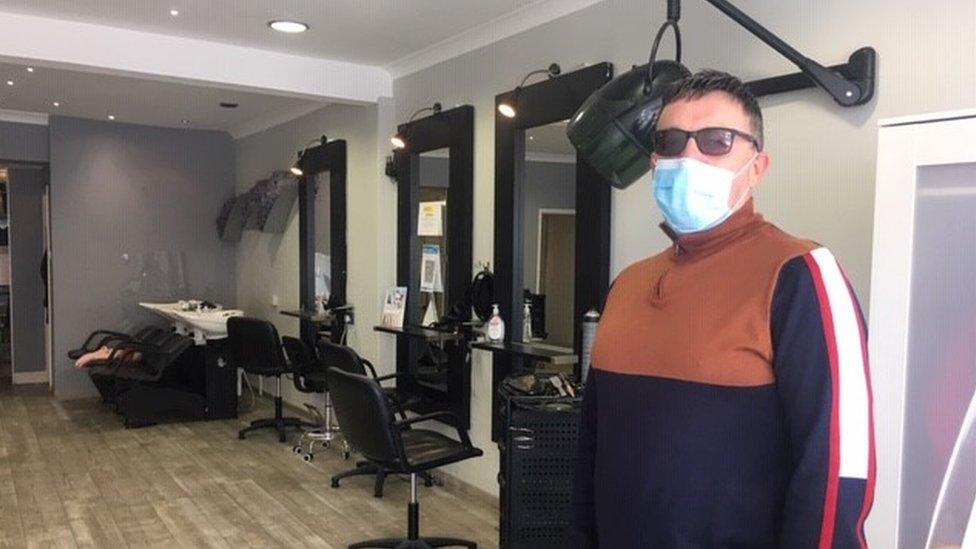 Salon owner Michael James said businesses were "living on a knife edge"