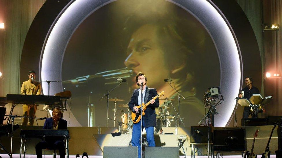 Alex Turner (C) of the Arctic Monkeys performs on Main Stage East on Day 3 of Leeds Festival on August 28, 2022 in Leeds, England.