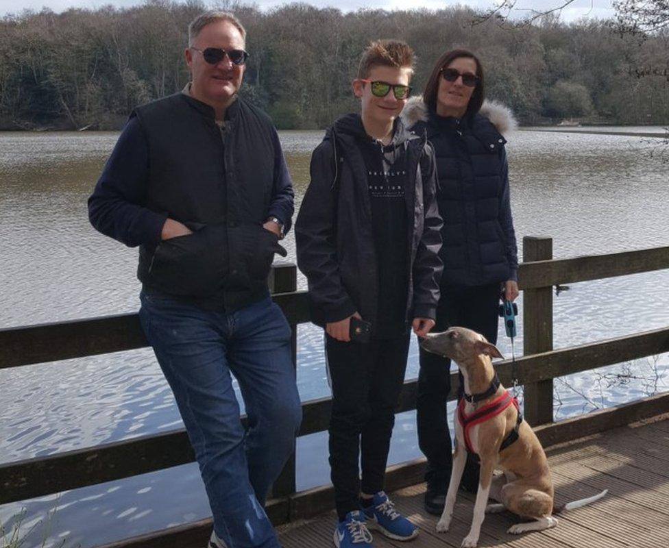 Daniel Moncaster with his parents and the family dog Nico