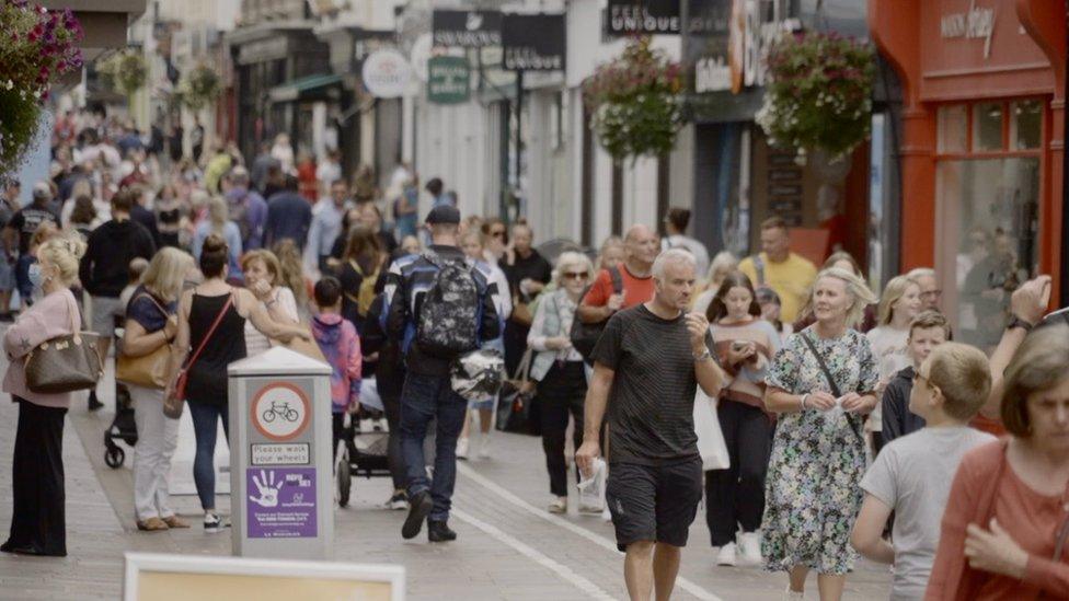 People walking in St Helier