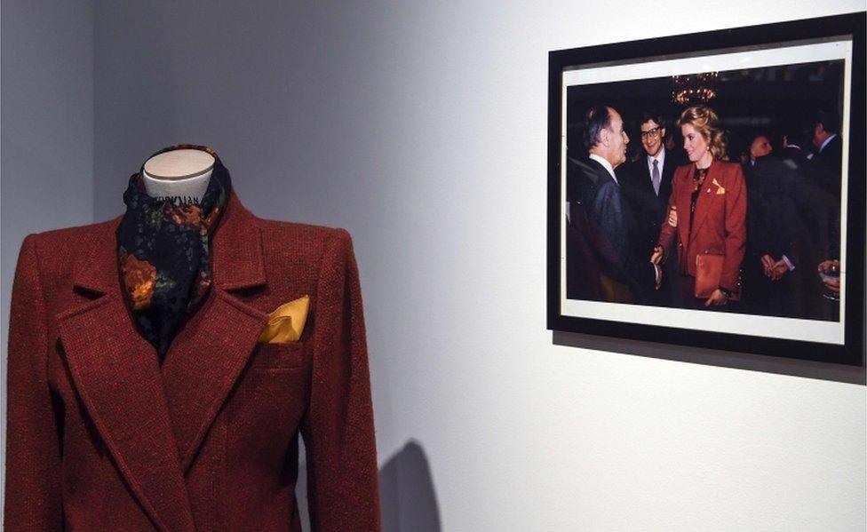 An Yves Saint Laurent coat displayed at the Christie's auction house in Paris on January 18, 2019