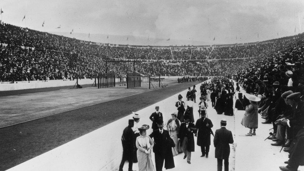 Black and white photograph shows crowds gathering at the first modern Olympic Games in Athens