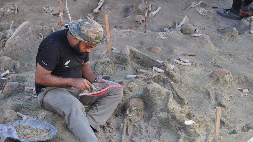 Forensic archaeologist at the mass grave in Mannar