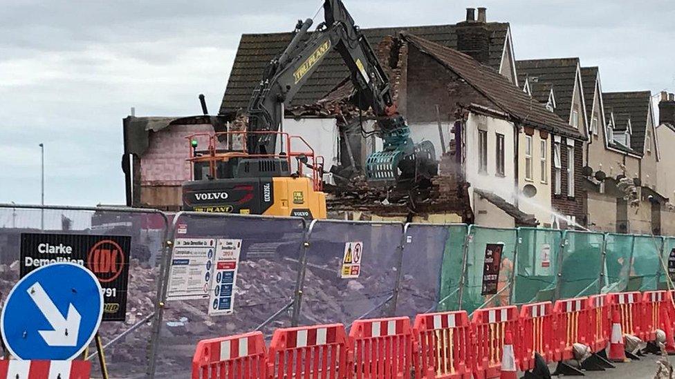 Houses being demolished