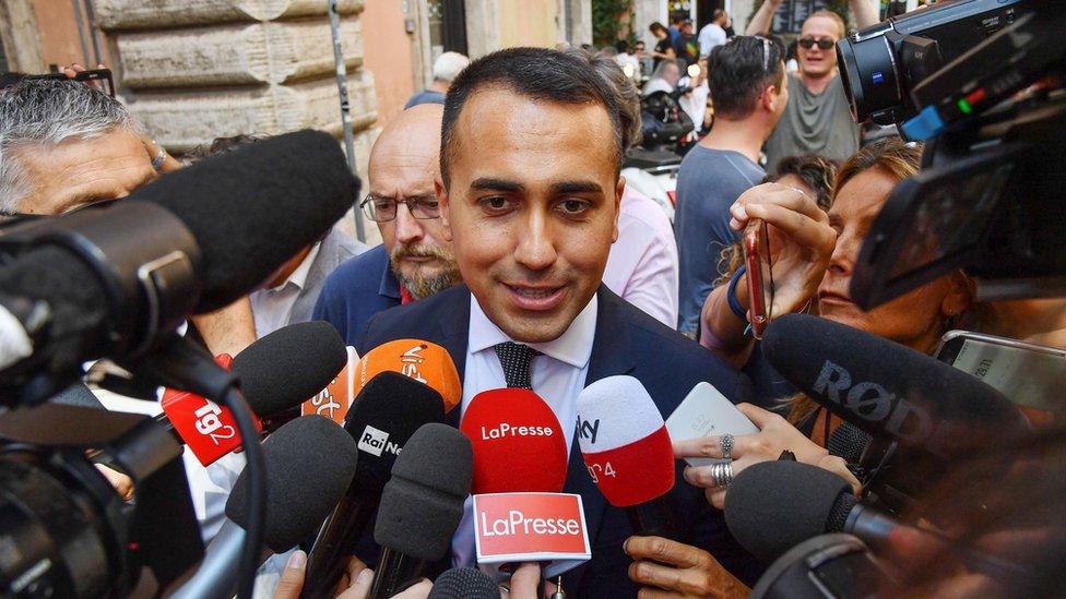 Five Star leader Luigi Di Maio talks to reporters on 3 September