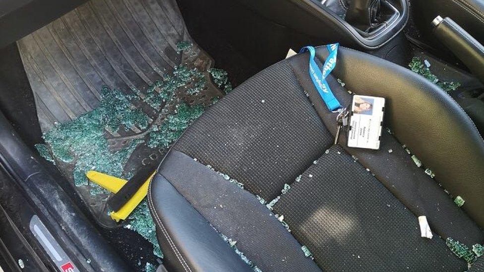 Glass inside car after being broken into