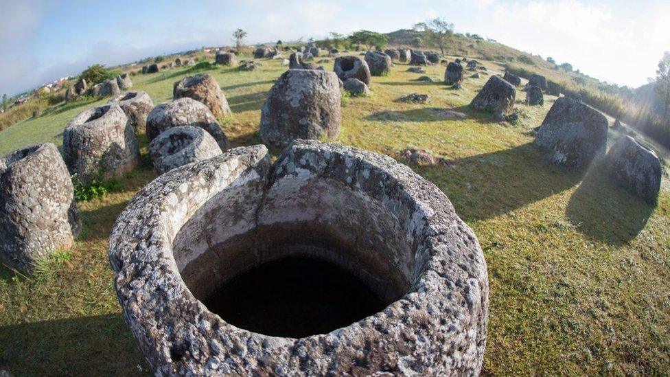 jars sit1 in the morning near the town of Phonsavan in the province Xieng Khuang in north Lao in southeastasia.