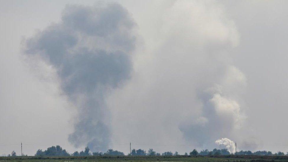 A view shows smoke rising above the area following an alleged explosion in the village of Maiske in the Dzhankoi district, Crimea