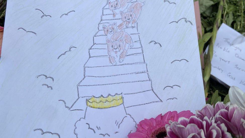 A drawing shows Corgis rushing to meet the Queen at the gates of Heaven