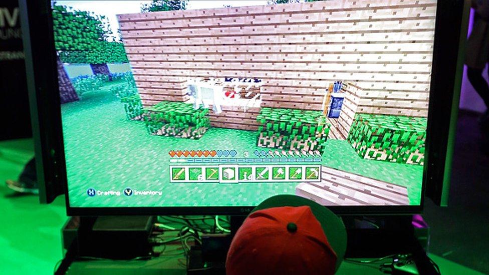 A child playing Minecraft