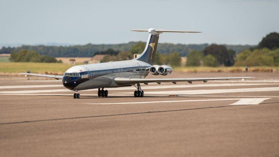 Model airliner on runway