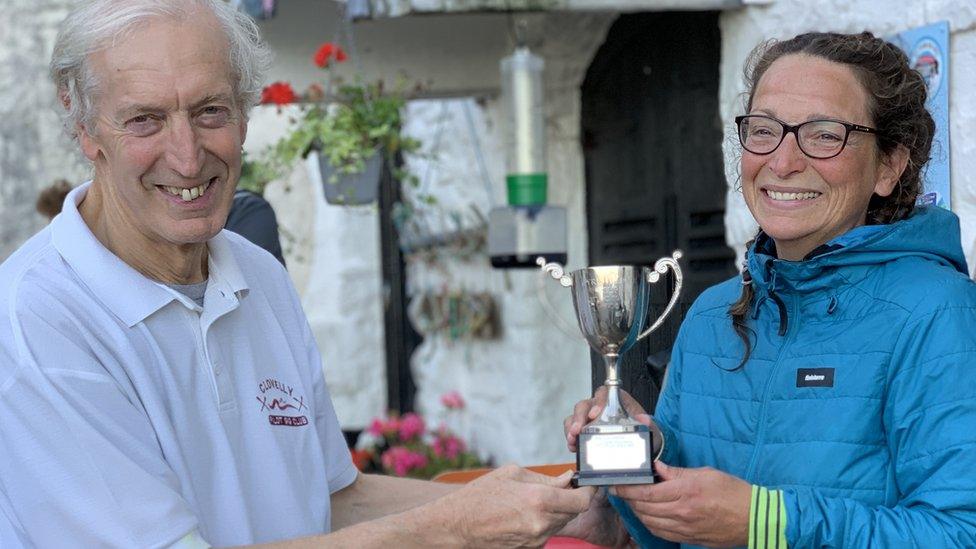 Trophy being presented to Sadie Davies