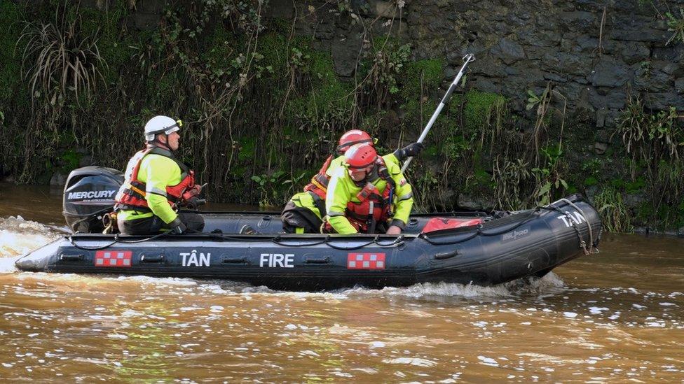 Crew in a boat on the River Cleddau