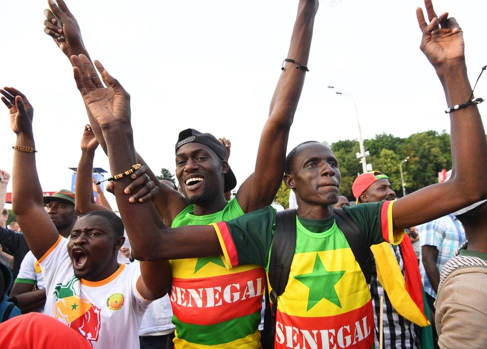 Supporters of Senegal celebrate in the FIFA Fan Zone in Moscow, Russia, 19 June 2018. Senegal won 2-1 in the FIFA World Cup 2018 group H preliminary round soccer match against Poland.