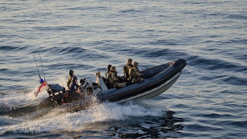 Sea boats launched from HMS Dragon