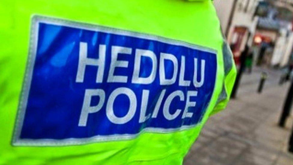 Police officer on a street in Wales