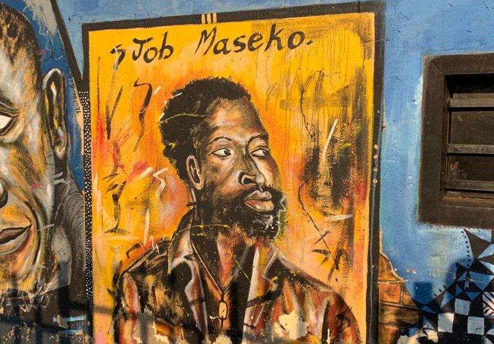 Portrait mural of Job Maseko