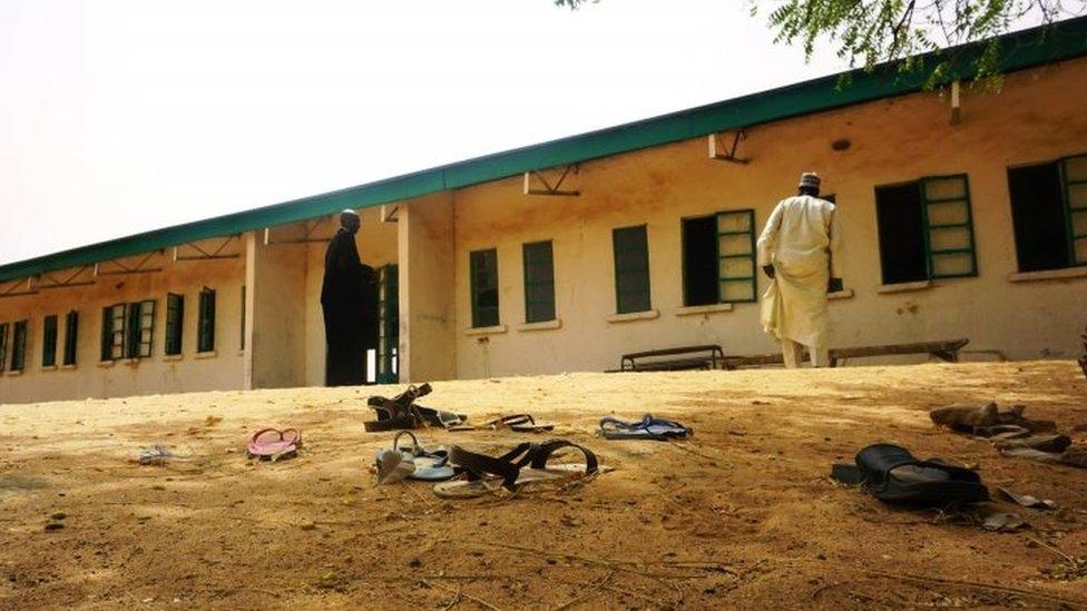 Sandals are strewn in the yard of the Government Girls Science and Technical College in Dapchi, Nigeria. Photo: 22 February 2018