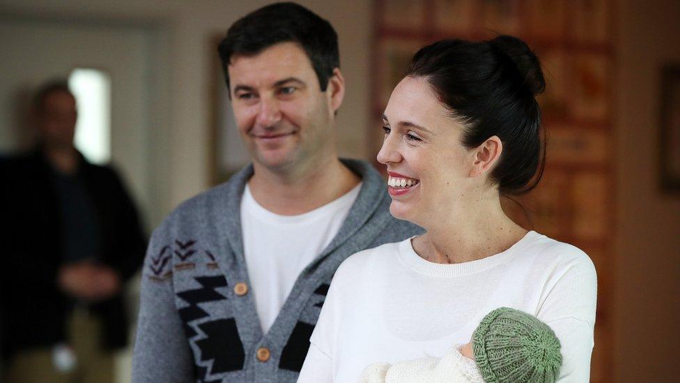 Jacinda Ardern holding her baby.