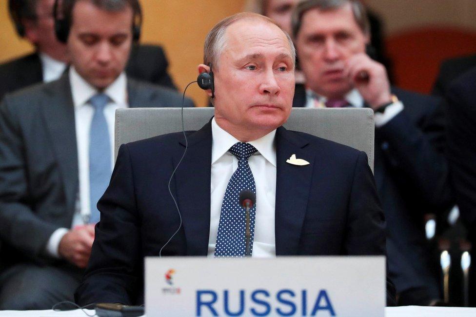 Russian President Vladimir Putin attends a BRICS leaders' meeting as he takes part in the G20 summit in Hamburg, 7 July