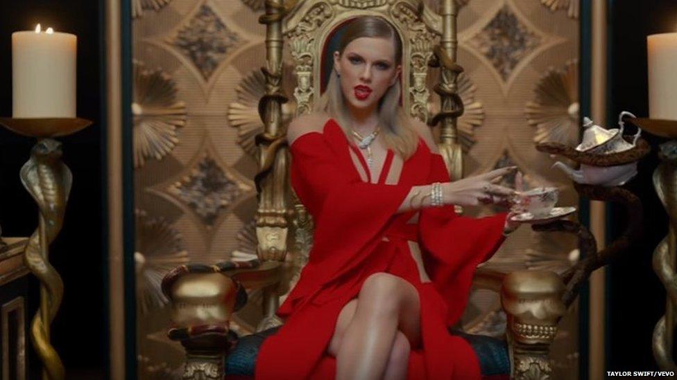 Taylor Swift on a throne