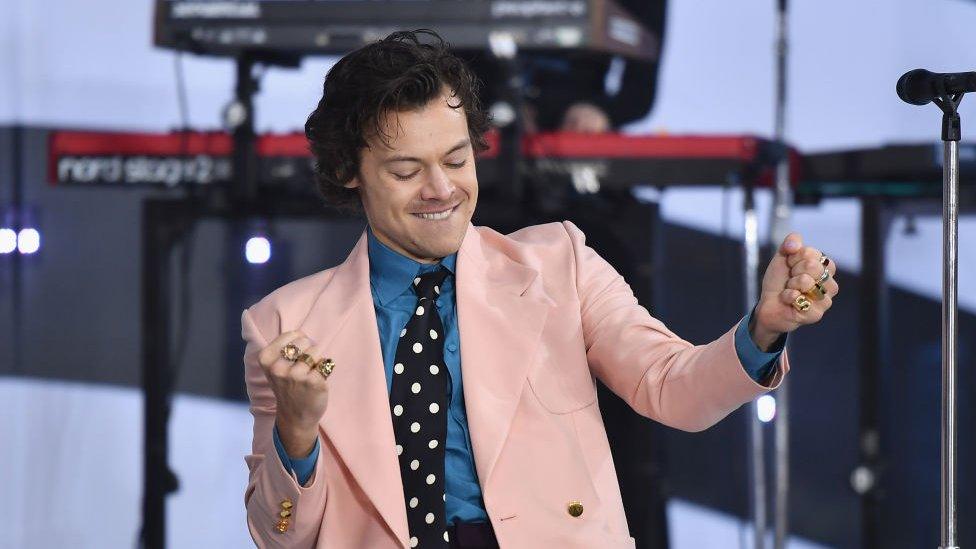 Singer Harry styles performing